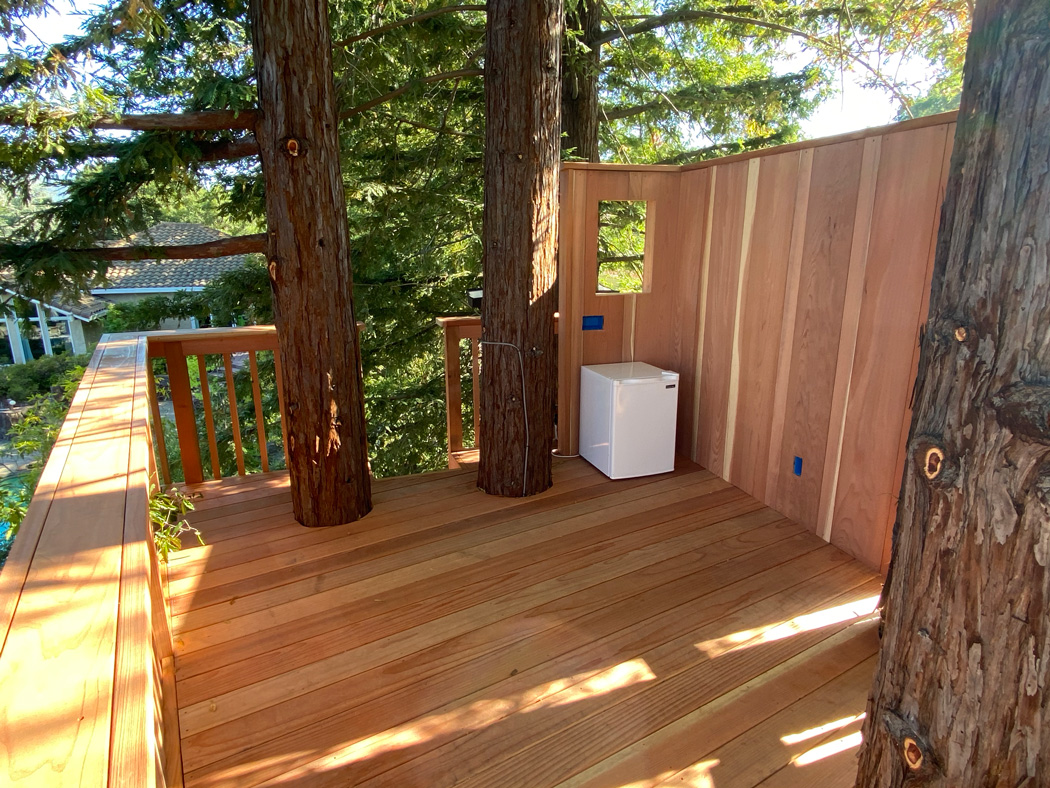 View of the treehouse decking and wall